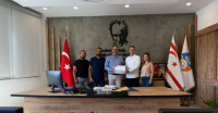 İEZB’den İskele Belediye Başkanı Hasan Sadıkoğlu’na Ziyaret: İş Birliği ve Ortak Projeler Gündemde